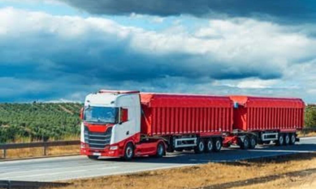 Two Semi Trucks and Full Trailers